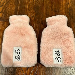 Two hot water bag with Chinese character of ‘Ha Ha’